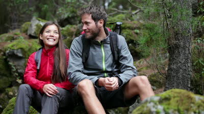 Couple taking a break from hiking