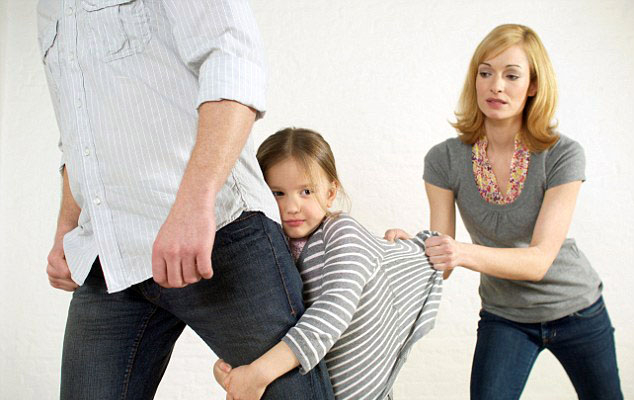 Girl being torn by parent's divorce