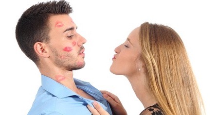 woman trying to kiss a man 