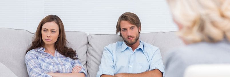 unhappy couple sees marriage counselor